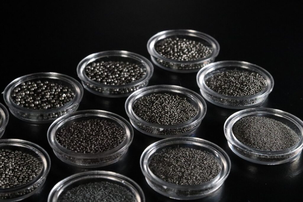 Small jars of blasting media