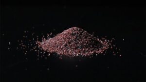 Small sample of garnet blasting media