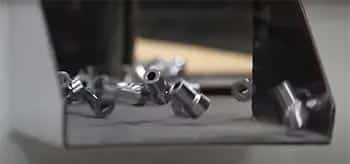 Shot blasting, vibratory finishing, wet blasting, and more parts being processed through vibratory finishing