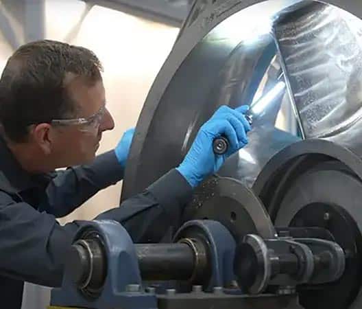 Man inspecting aerospace finishing Man inspecting aerospace finishing